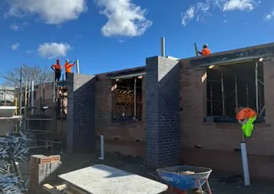 Detailed brick wall featuring an architectural doorway opening